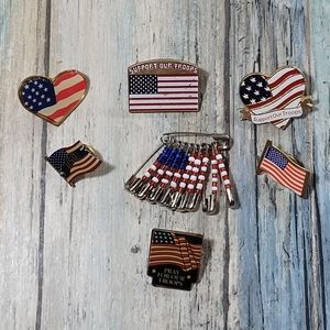 Seven Patriotic American Flag Pins.